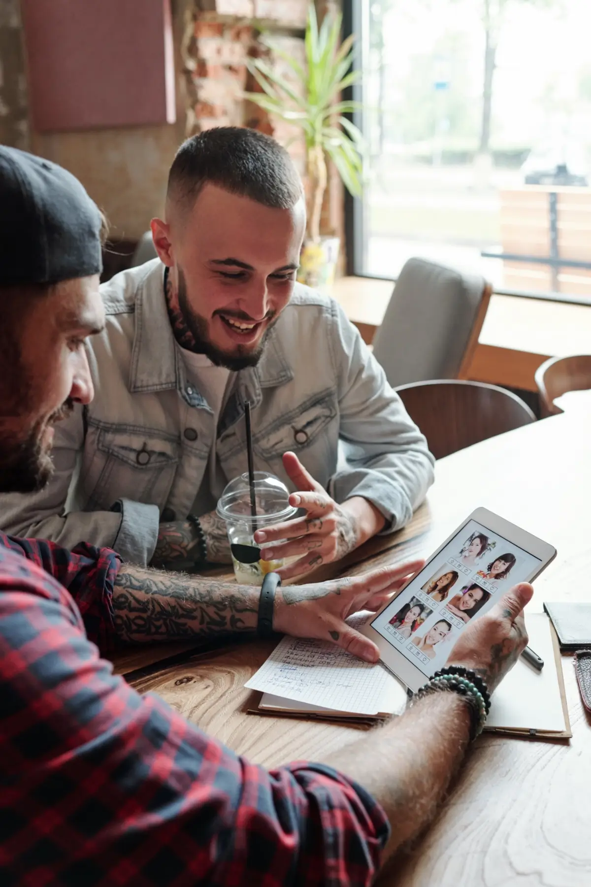 Digital marketing professionals reviewing brand profiles and audience insights